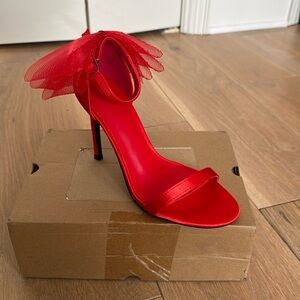 Bow heels, red, ladies 6.5, brand new only worn indoors